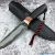 Beautiful gift knife with a forged blade made of laminated Damascus steel, 100% handmade - # 22 (made in Russia)