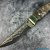Knife № 24 with a forged blade of laminated Damascus steel, handmade by forging.